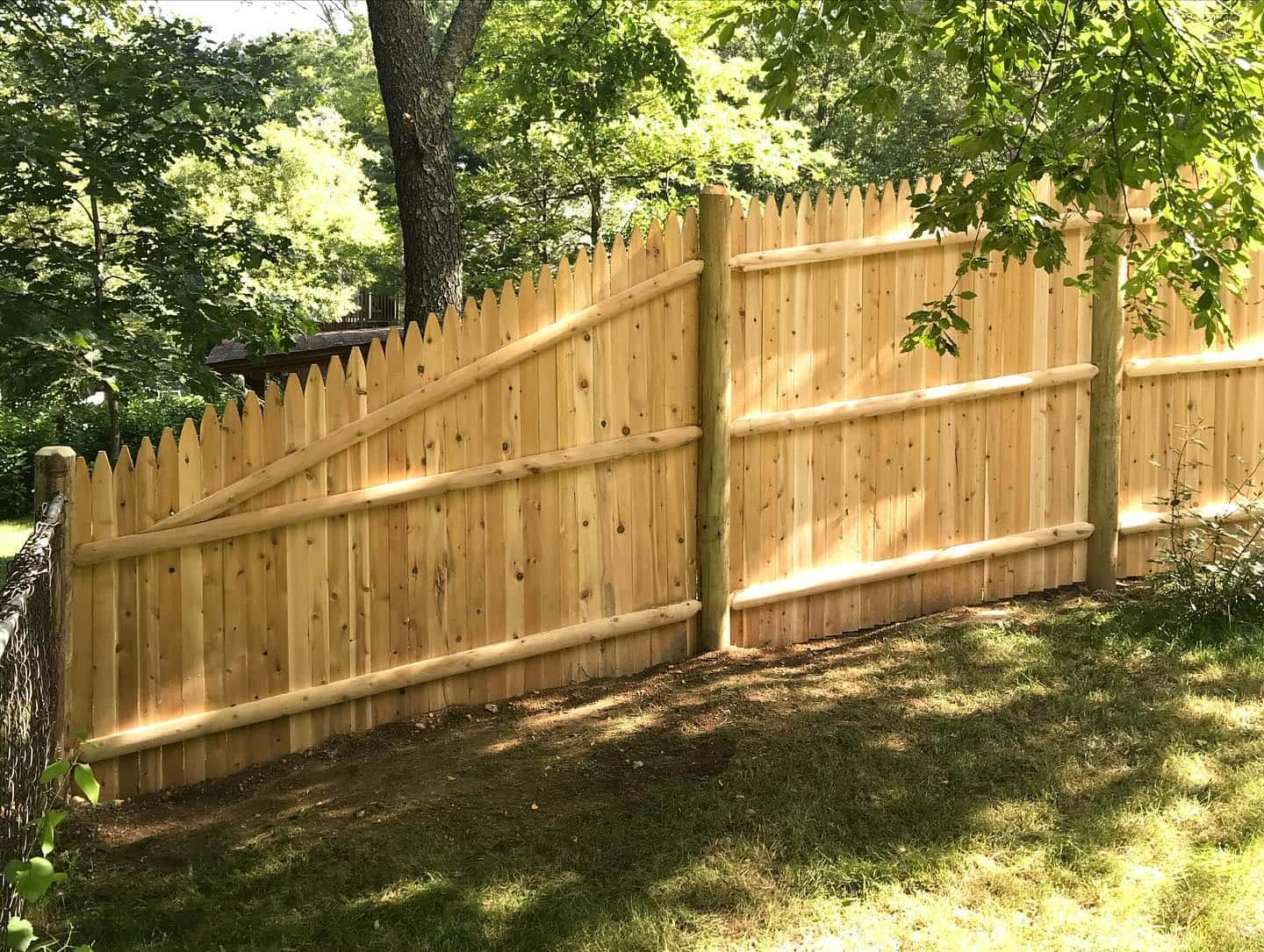 Wood fence installation in Bellingham, Massachusetts
